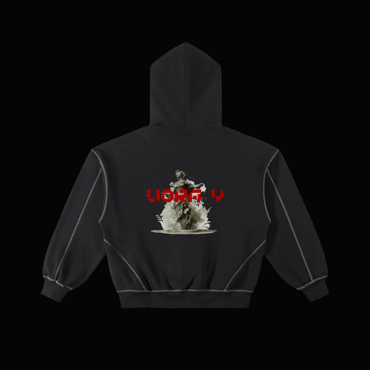 Black hoodie with graphic design on the back against a white background